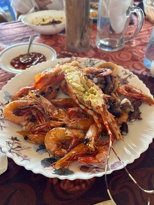 Grilled prawns served on a table during Wasini Island seafood feast