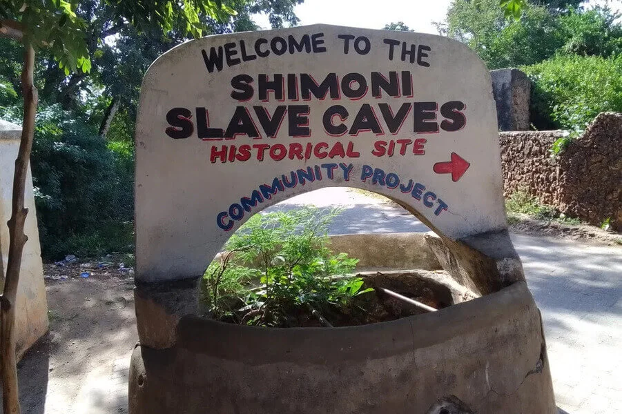 Shimoni Caves Welcome Sign – Historic Entry Point in Kenya