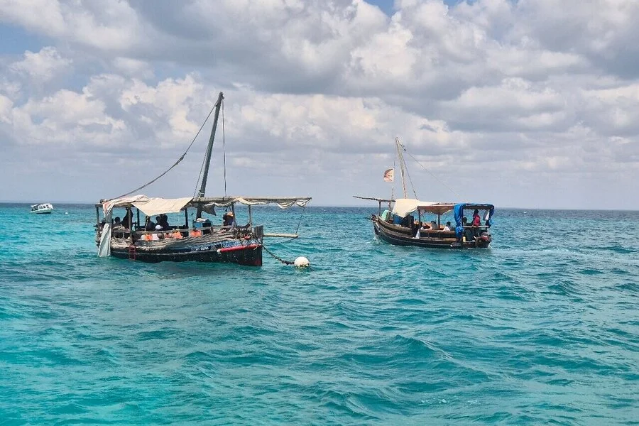 Wasini Island dhow cruise sailing to Kisite Marine Park for snorkeling Wasini Island tour boats - dhow cruise excursion