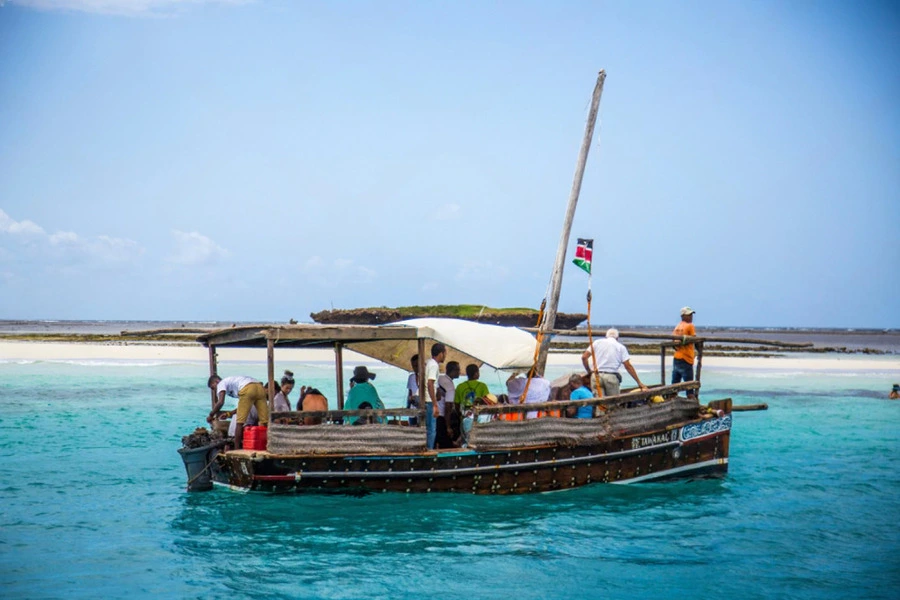 Experience Wasini and Kisite Islands day tour for dolphins spotting and snorkeling Wasini and Kisite visitors from Mombasa and Diani enjoy sandbank at Marine park